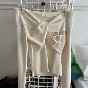 beige criss cross bow long sleeve